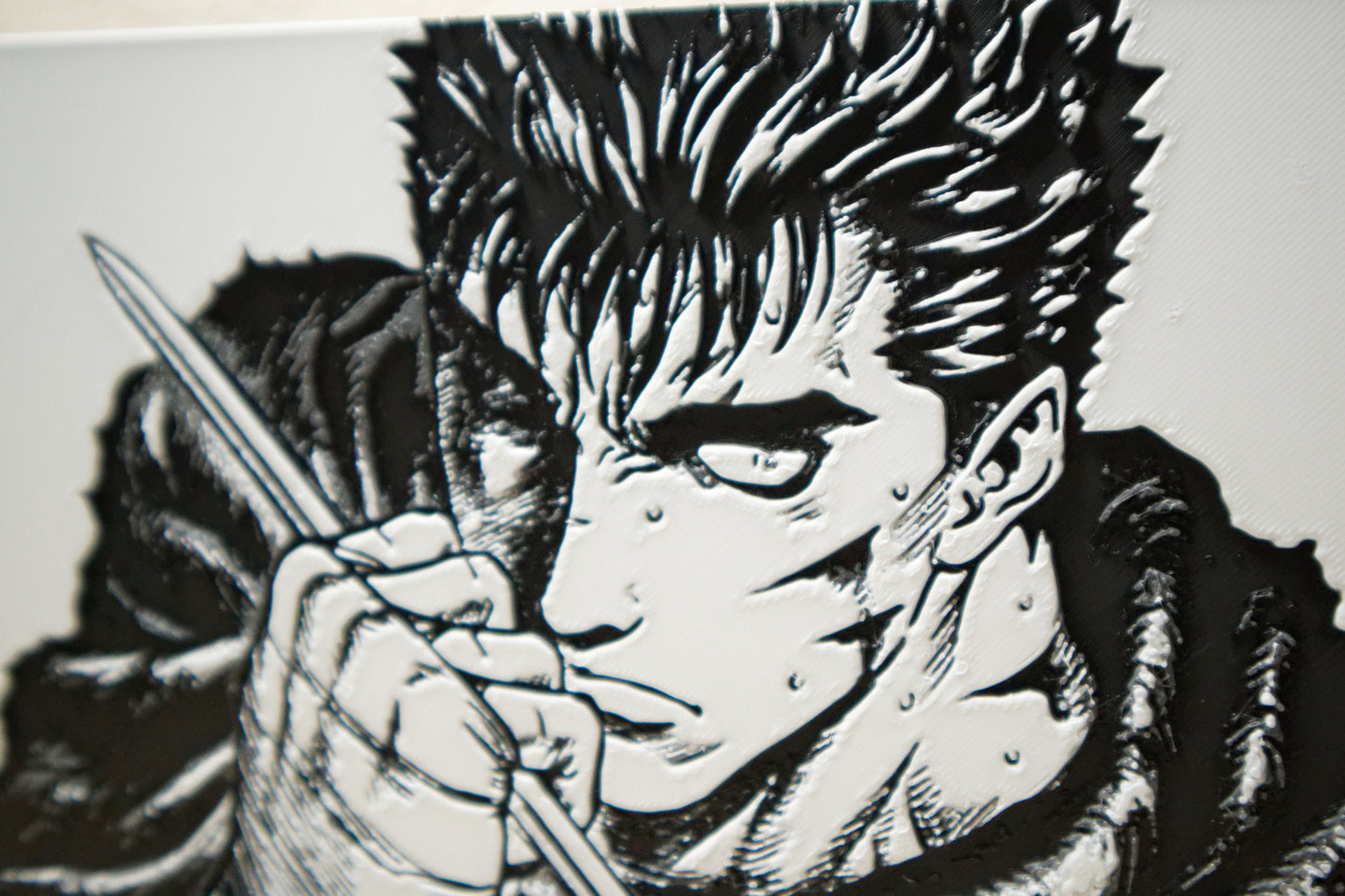 Retrato de Guts