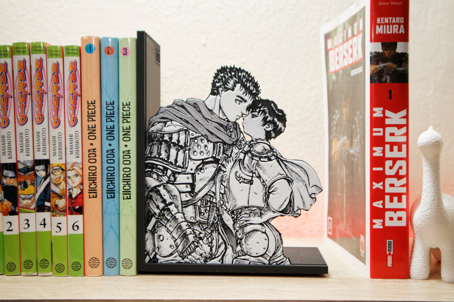 Sujetalibros de Guts y Casca