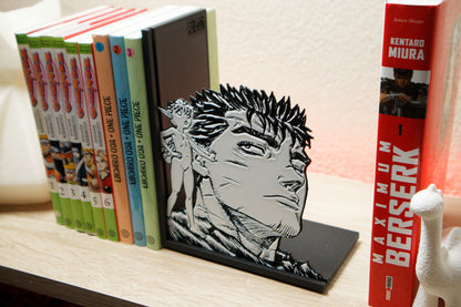 Sujetalibros de Guts y Puck